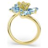 Anello aperto Idyllia con tagli misti, fiore, blu, placcato oro Anello aperto Idyllia con tagli misti, fiore, blu, placcato oro