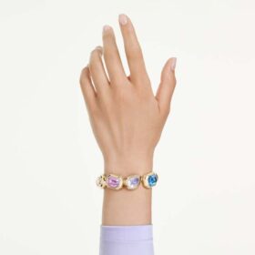 Bracciale Gema con cristalli oversize, tagli misti, multicolore, placcato in oro Bracciale Gema con cristalli oversize, tagli misti, multicolore, placcato in oro
