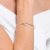 Bracciale Hyperbola con simbolo dell’Infinity e cuore, bianco, finitura in metalli misti Bracciale Hyperbola con simbolo dell’Infinity e cuore, bianco, finitura in metalli misti