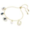 Bracciale Symbolica con perla di cristallo, trifoglio, occhio malvagio e ferro di cavallo, blu, placcato in oro