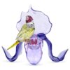 Idyllia: fringuello di Gould e orchidea