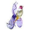 Idyllia: fringuello di Gould e orchidea