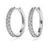 Orecchini a cerchio Eternity con diamanti sintetici 0,56 ct totali, forma rotonda, argento sterling Orecchini a cerchio Eternity con diamanti sintetici 0,56 ct totali, forma rotonda, argento sterling