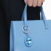Portachiavi con cristallo taglio ovale, blu, finitura in metalli misti